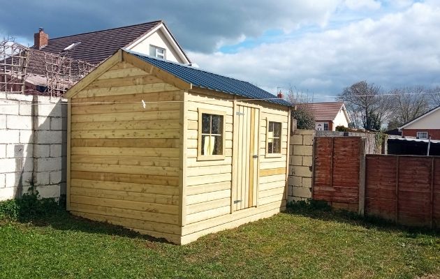 https://craftgardensheds.ie/combo-garden-sheds/11-cottage-combo-garden-shed-with-2-doors-internal-dividing-wall-2849.html